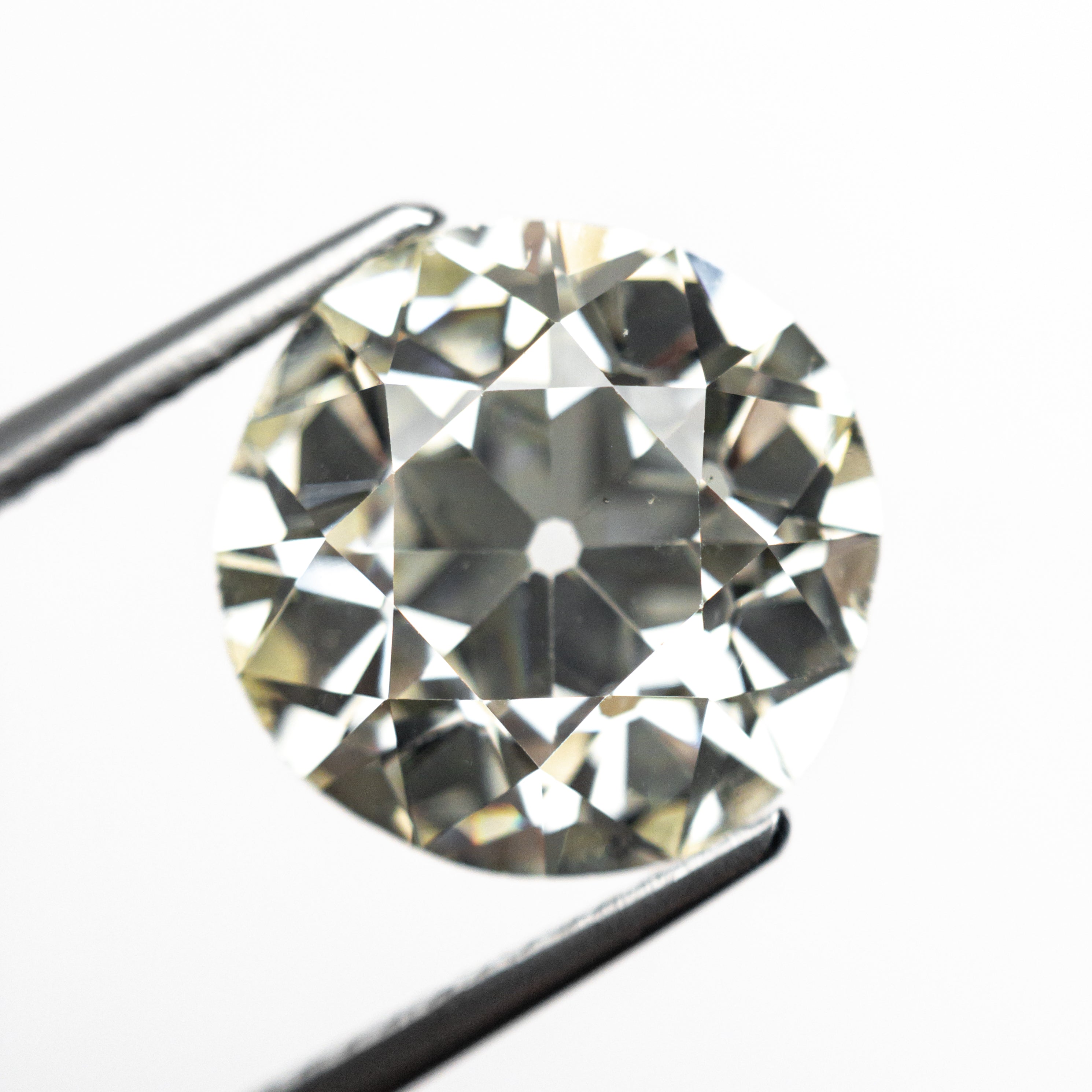 The 5.85ct 11.68x11.34x6.96mm GIA SI1 O-P Antique Old European Cut 25950-01 by East London jeweller Rachel Boston | Discover our collections of unique and timeless engagement rings, wedding rings, and modern fine jewellery.