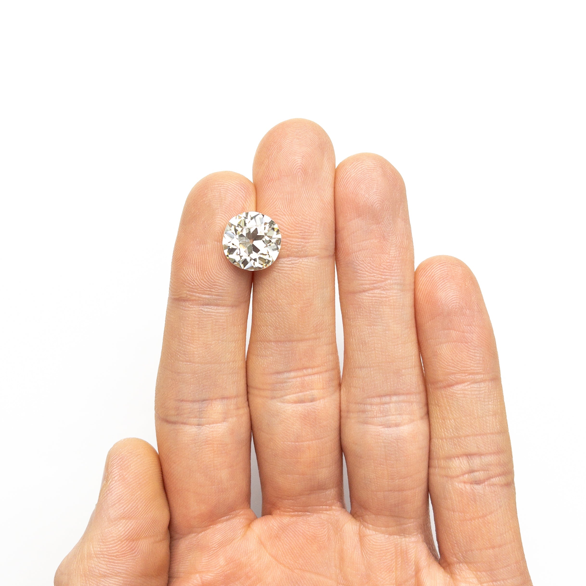 The 5.85ct 11.68x11.34x6.96mm GIA SI1 O-P Antique Old European Cut 25950-01 by East London jeweller Rachel Boston | Discover our collections of unique and timeless engagement rings, wedding rings, and modern fine jewellery.