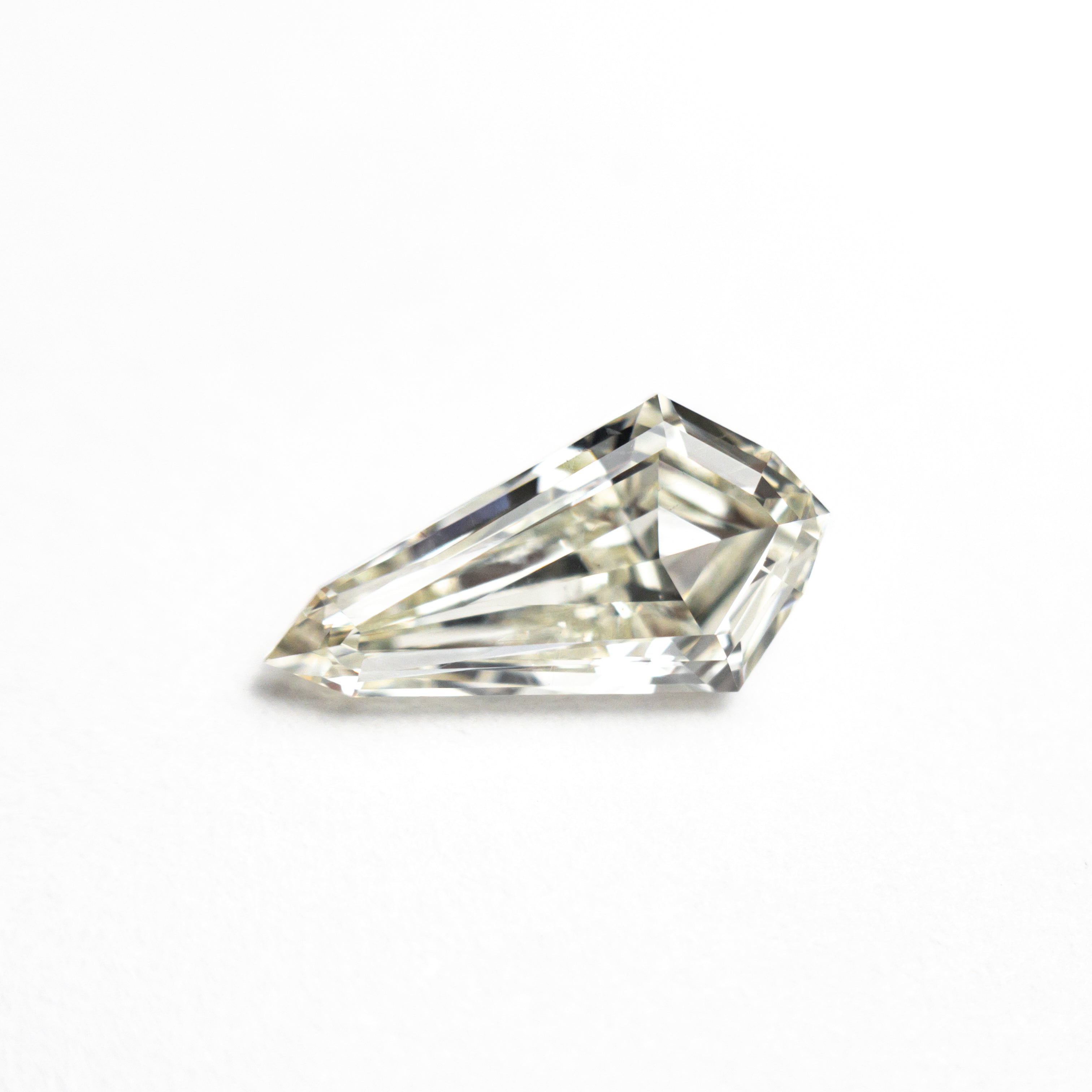 The 0.95ct 9.89x5.22x2.99mm SI1 L Shield Step Cut 25955-02 by East London jeweller Rachel Boston | Discover our collections of unique and timeless engagement rings, wedding rings, and modern fine jewellery.