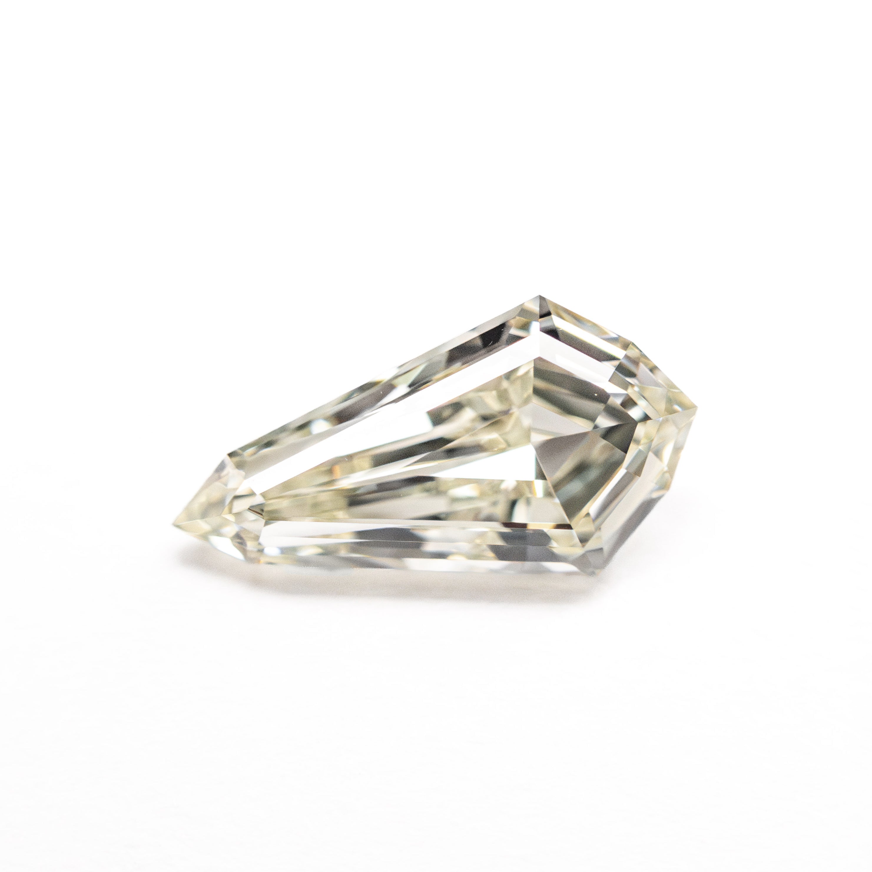 The 1.02ct 10.15x5.35x3.01mm VVS2 M-N Shield Step Cut 25957-01 by East London jeweller Rachel Boston | Discover our collections of unique and timeless engagement rings, wedding rings, and modern fine jewellery.