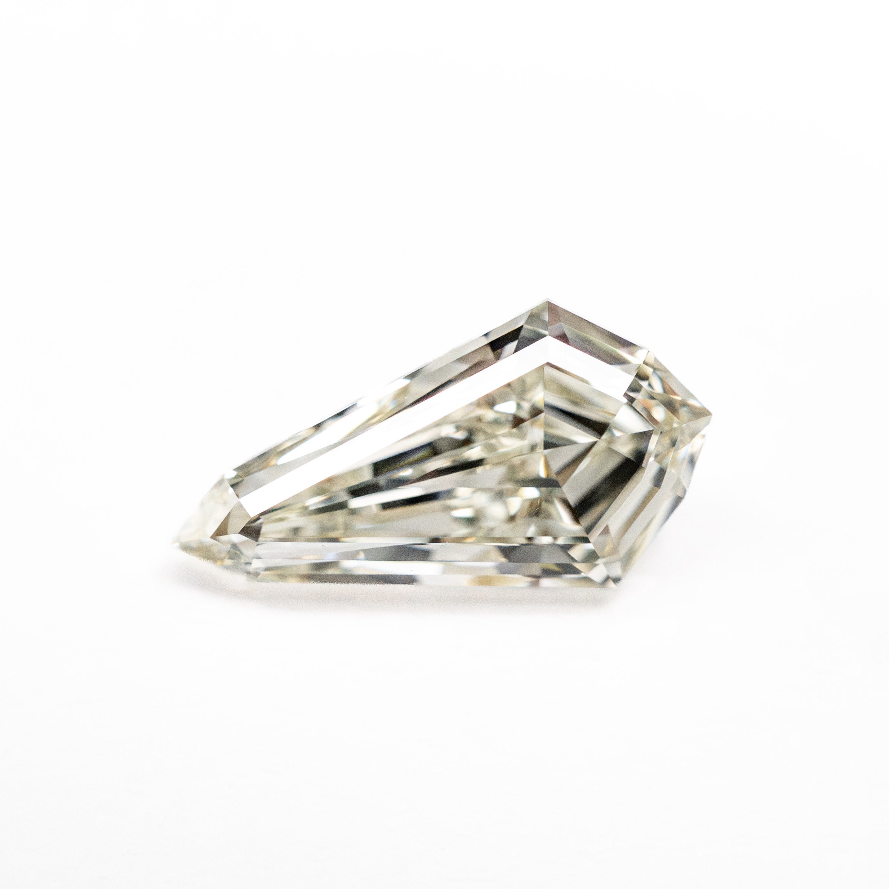 The 1.00ct 10.15x5.36x3.05mm VVS1 L Shield Step Cut 25957-02 by East London jeweller Rachel Boston | Discover our collections of unique and timeless engagement rings, wedding rings, and modern fine jewellery.