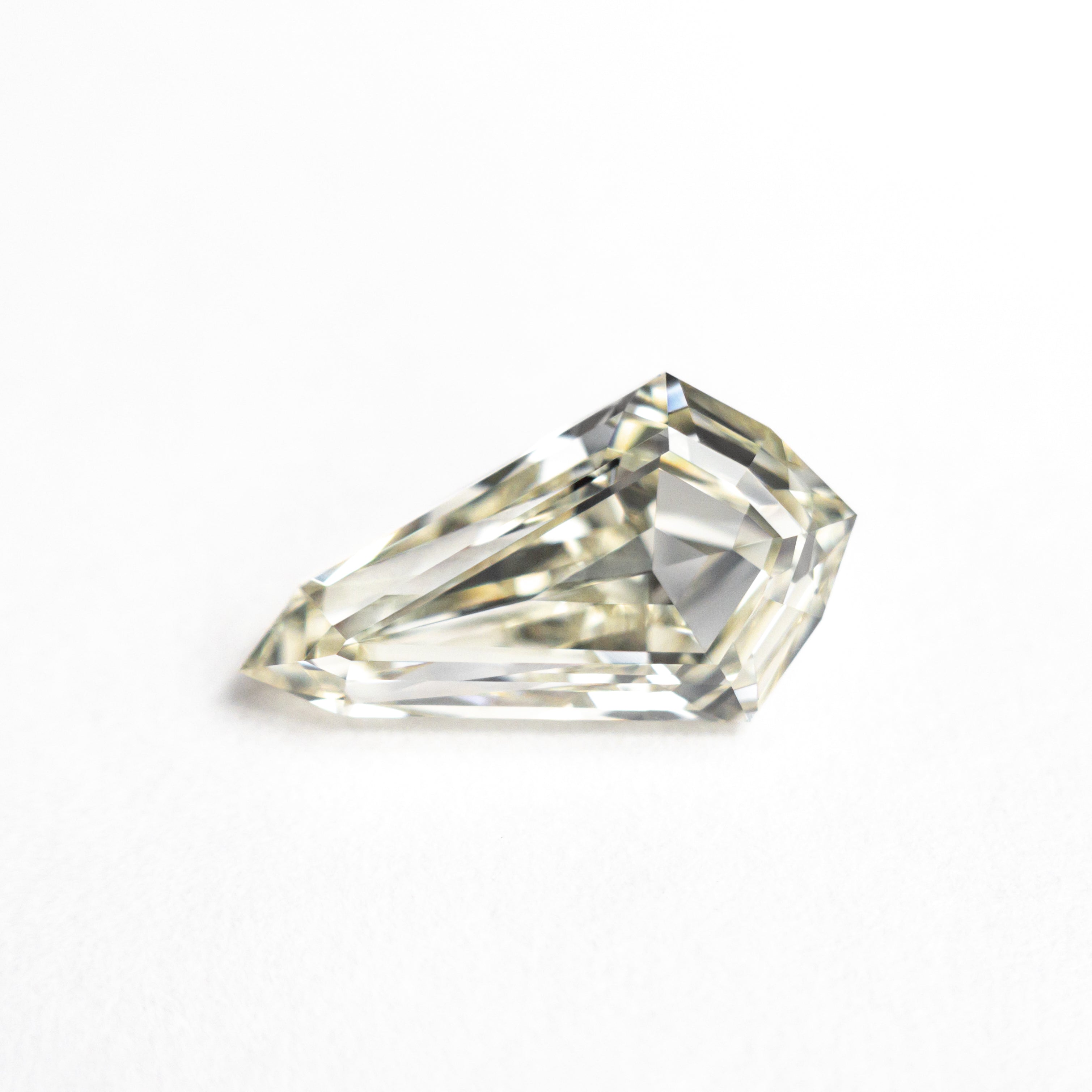 The 1.51ct 10.90x6.18x3.57mm VVS1 M-N Shield Step Cut 25958-02 by East London jeweller Rachel Boston | Discover our collections of unique and timeless engagement rings, wedding rings, and modern fine jewellery.