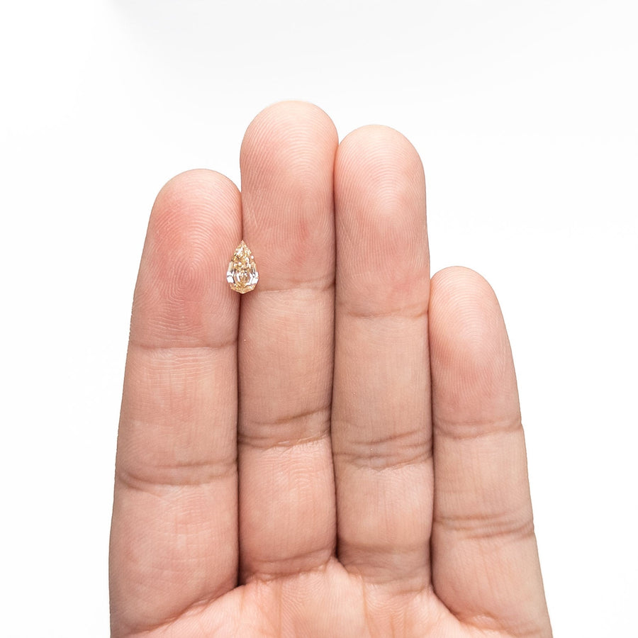 The 0.76ct 7.97x4.72x2.99mm VS1 C4 Geo Pear Step Cut 🇿🇦 26109-05 by East London jeweller Rachel Boston | Discover our collections of unique and timeless engagement rings, wedding rings, and modern fine jewellery. - Rachel Boston Jewellery