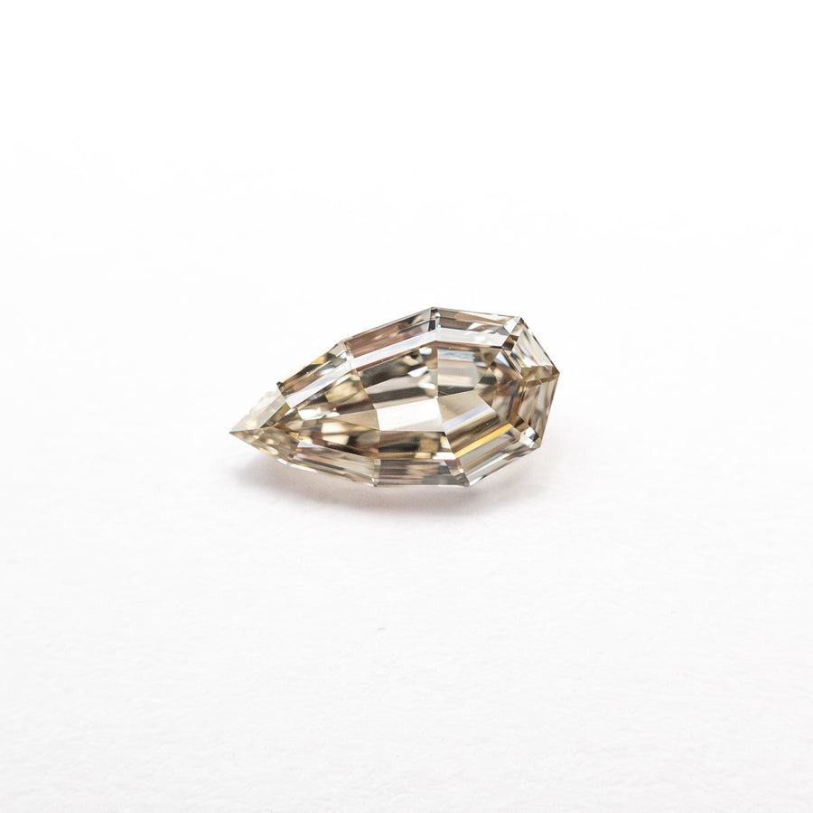 The 0.38ct 6.98x3.79x2.04mm VS1 C3 Geo Pear Step Cut 🇿🇦 26109-06 by East London jeweller Rachel Boston | Discover our collections of unique and timeless engagement rings, wedding rings, and modern fine jewellery. - Rachel Boston Jewellery