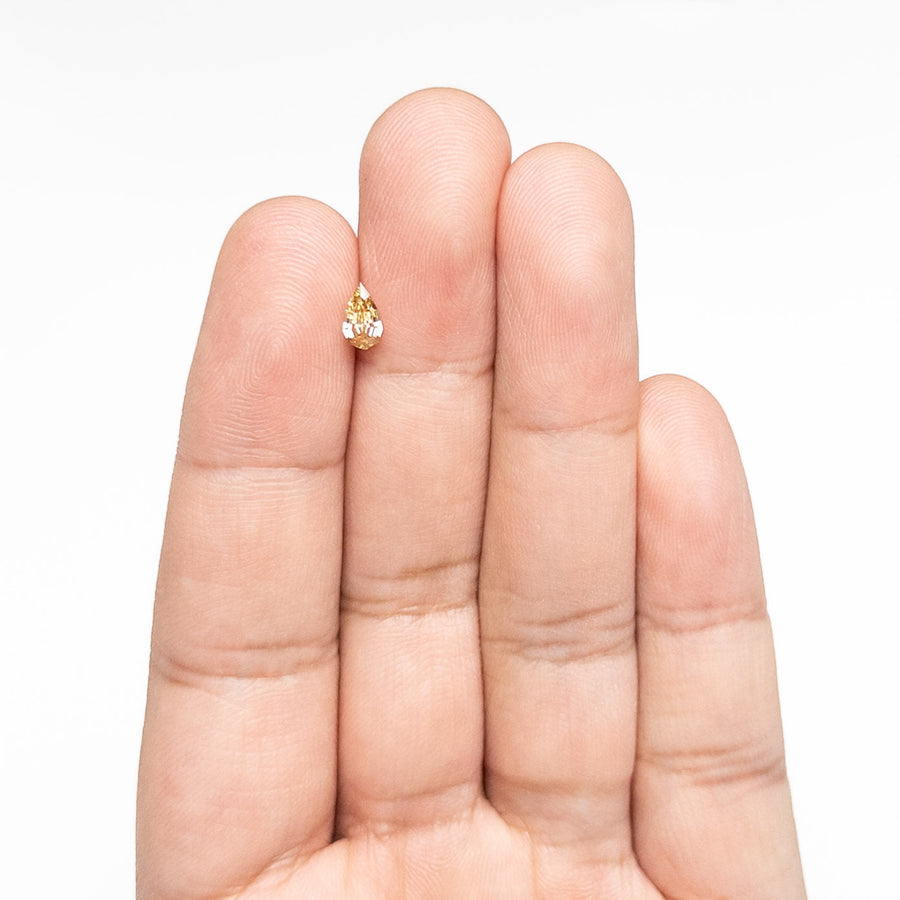 The 0.38ct 6.98x3.79x2.04mm VS1 C3 Geo Pear Step Cut 🇿🇦 26109-06 by East London jeweller Rachel Boston | Discover our collections of unique and timeless engagement rings, wedding rings, and modern fine jewellery. - Rachel Boston Jewellery