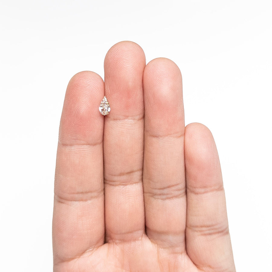 The 0.39ct 7.00x4.05x2.13mm VVS2 C3 Geo Pear Step Cut 🇿🇦 26109-08 by East London jeweller Rachel Boston | Discover our collections of unique and timeless engagement rings, wedding rings, and modern fine jewellery. - Rachel Boston Jewellery