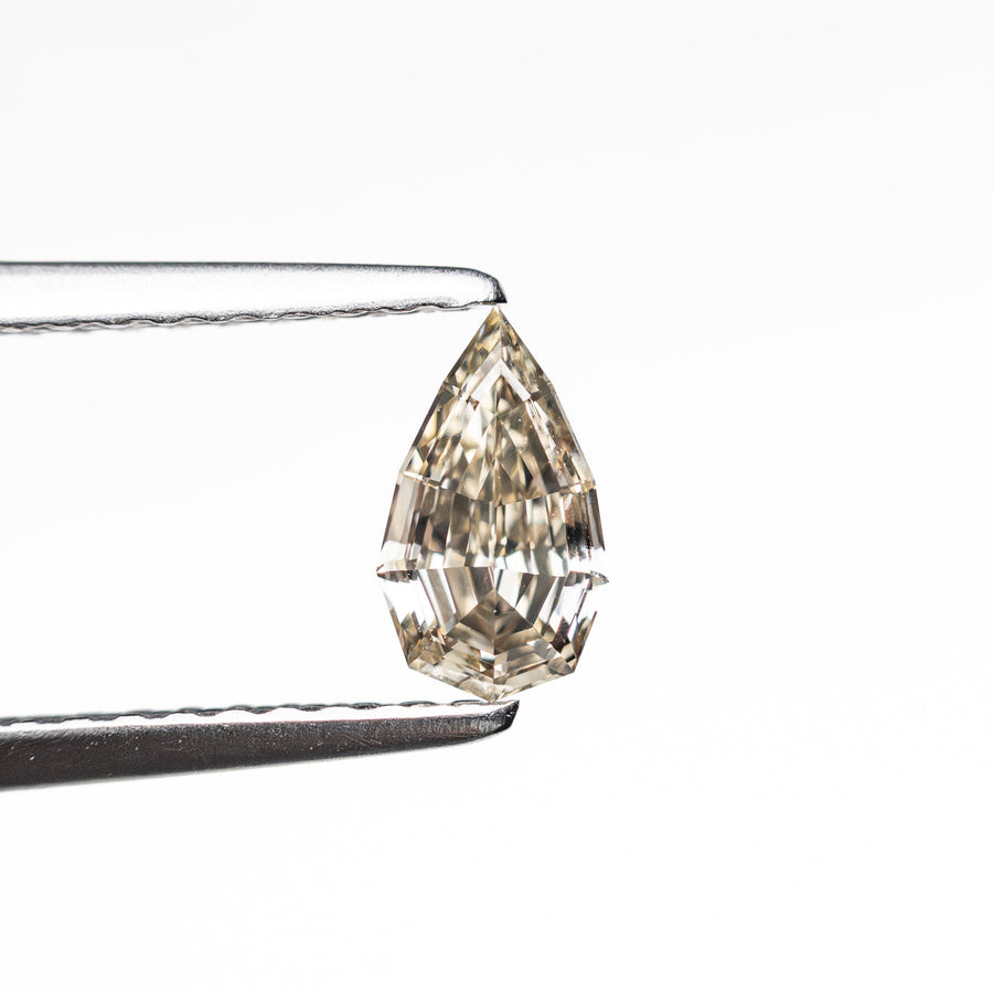 The 0.39ct 6.61x3.88x2.33mm VVS2 C3 Geo Pear Step Cut 🇿🇦 26109-12 by East London jeweller Rachel Boston | Discover our collections of unique and timeless engagement rings, wedding rings, and modern fine jewellery. - Rachel Boston Jewellery