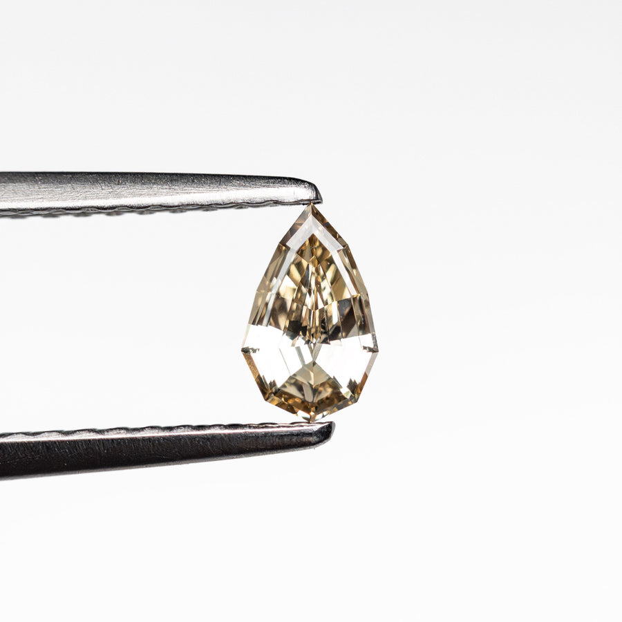 The 0.37ct 6.55x3.85x2.30mm VS1 C5 Geo Pear Step Cut 🇿🇦 26109-14 by East London jeweller Rachel Boston | Discover our collections of unique and timeless engagement rings, wedding rings, and modern fine jewellery. - Rachel Boston Jewellery
