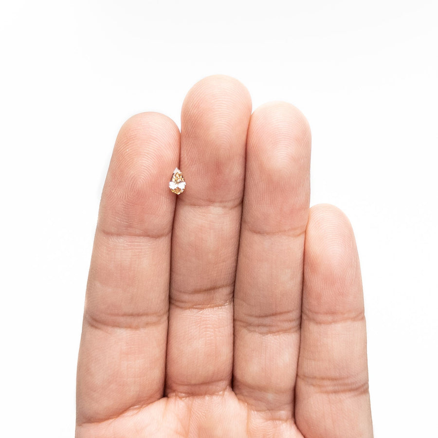 The 0.37ct 6.55x3.85x2.30mm VS1 C5 Geo Pear Step Cut 🇿🇦 26109-14 by East London jeweller Rachel Boston | Discover our collections of unique and timeless engagement rings, wedding rings, and modern fine jewellery. - Rachel Boston Jewellery