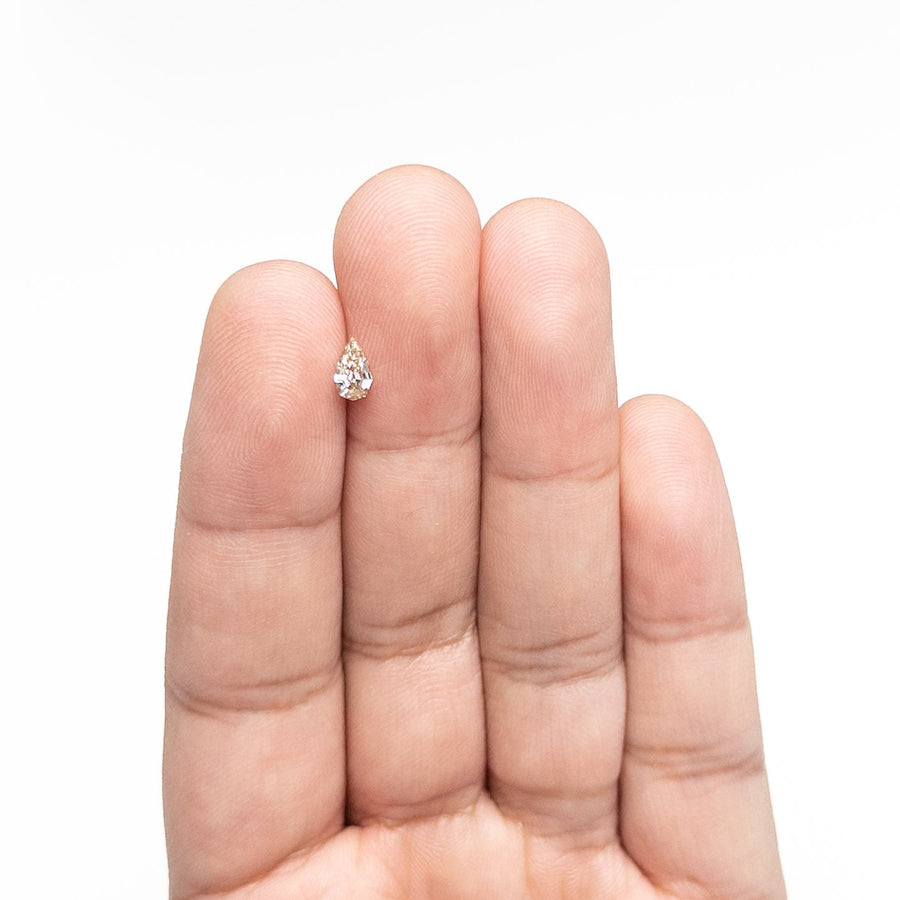 The 0.33ct 6.32x3.77x2.21mm VVS2 C3 Geo Pear Step Cut 🇿🇦 26109-21 by East London jeweller Rachel Boston | Discover our collections of unique and timeless engagement rings, wedding rings, and modern fine jewellery. - Rachel Boston Jewellery