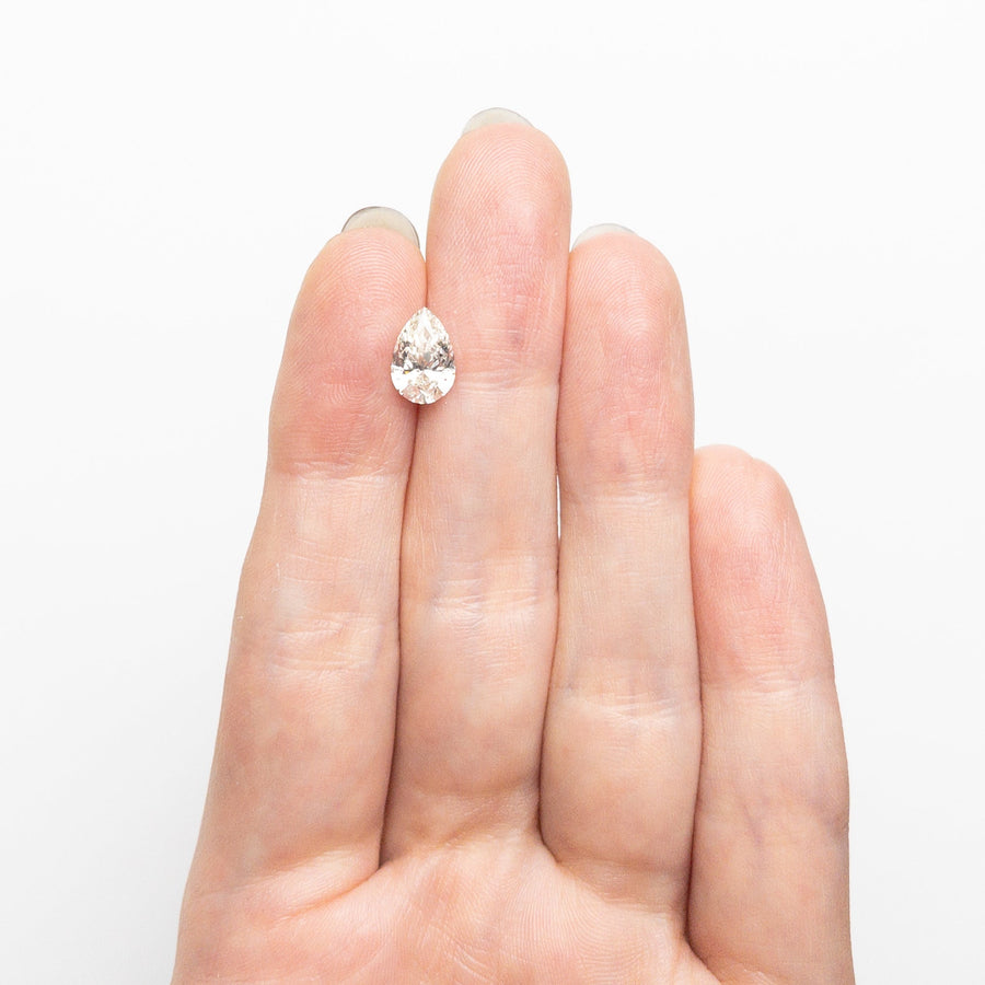 The 1.21ct 9.04x5.99x3.65mm VVS2 K Pear Brilliant 🇨🇦 26120-05 by East London jeweller Rachel Boston | Discover our collections of unique and timeless engagement rings, wedding rings, and modern fine jewellery. - Rachel Boston Jewellery