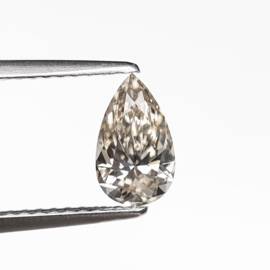 The 0.70ct 7.94x4.75x3.02mm VVS2 U-V Pear Brilliant 🇨🇦 26121-04 by East London jeweller Rachel Boston | Discover our collections of unique and timeless engagement rings, wedding rings, and modern fine jewellery. - Rachel Boston Jewellery