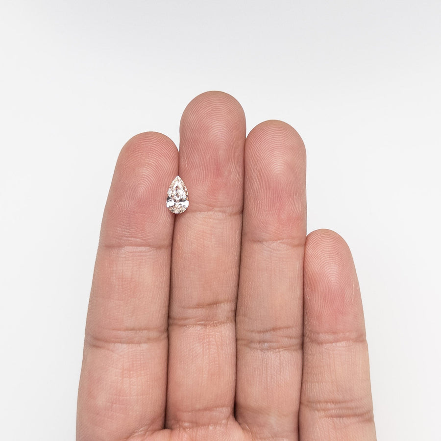 The 0.70ct 8.42x4.97x2.80mm VVS1 L Pear Brilliant 🇨🇦 26121-05 by East London jeweller Rachel Boston | Discover our collections of unique and timeless engagement rings, wedding rings, and modern fine jewellery. - Rachel Boston Jewellery