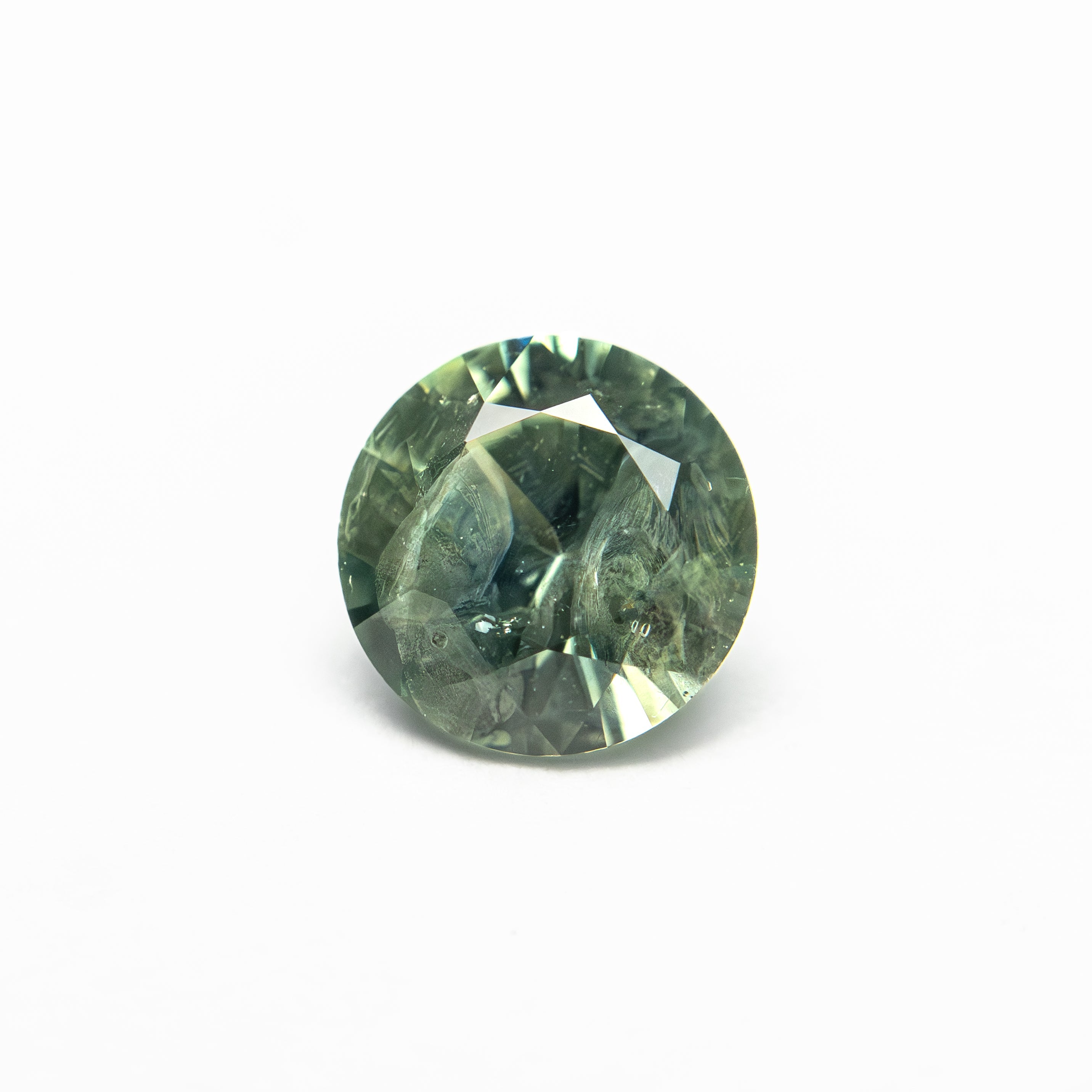 The 0.98ct 6.06x6.04x3.75mm Round Brilliant Sapphire 26141-22 by East London jeweller Rachel Boston | Discover our collections of unique and timeless engagement rings, wedding rings, and modern fine jewellery.