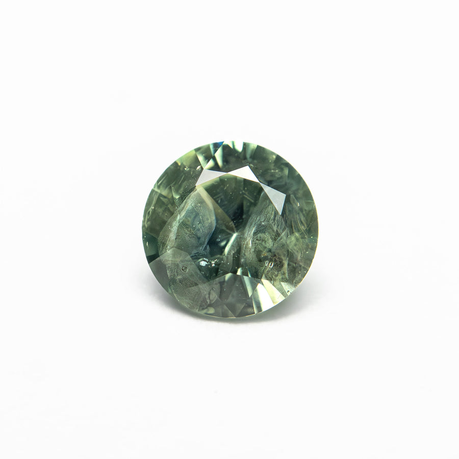 The 0.98ct 6.06x6.04x3.75mm Round Brilliant Sapphire 26141-22 by East London jeweller Rachel Boston | Discover our collections of unique and timeless engagement rings, wedding rings, and modern fine jewellery. - Rachel Boston Jewellery