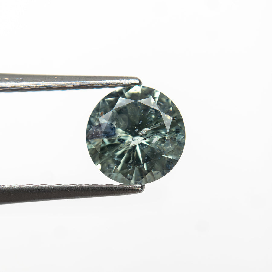 The 1.00ct 6.05x6.01x3.73mm Round Brilliant Sapphire 26141-28 by East London jeweller Rachel Boston | Discover our collections of unique and timeless engagement rings, wedding rings, and modern fine jewellery. - Rachel Boston Jewellery