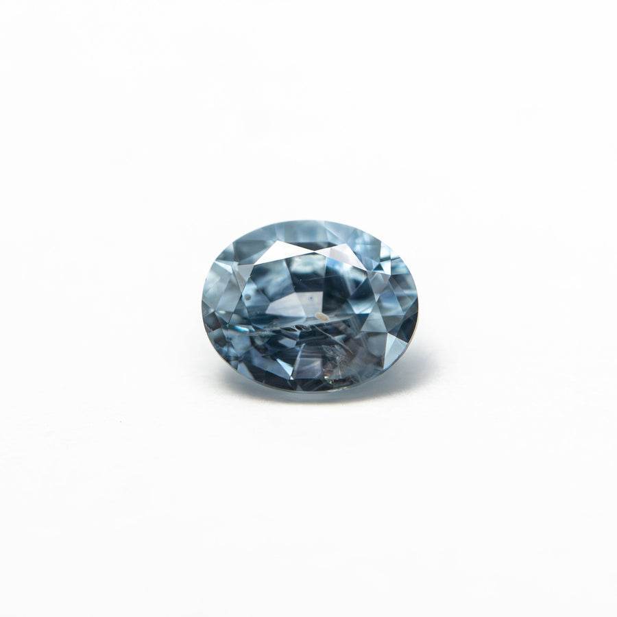 The 0.63ct 5.51x4.51x3.17mm Oval Brilliant Sapphire 26157-01 by East London jeweller Rachel Boston | Discover our collections of unique and timeless engagement rings, wedding rings, and modern fine jewellery. - Rachel Boston Jewellery