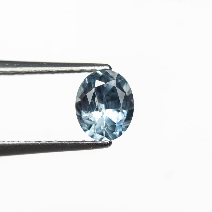 The 0.63ct 5.51x4.51x3.17mm Oval Brilliant Sapphire 26157-01 by East London jeweller Rachel Boston | Discover our collections of unique and timeless engagement rings, wedding rings, and modern fine jewellery. - Rachel Boston Jewellery