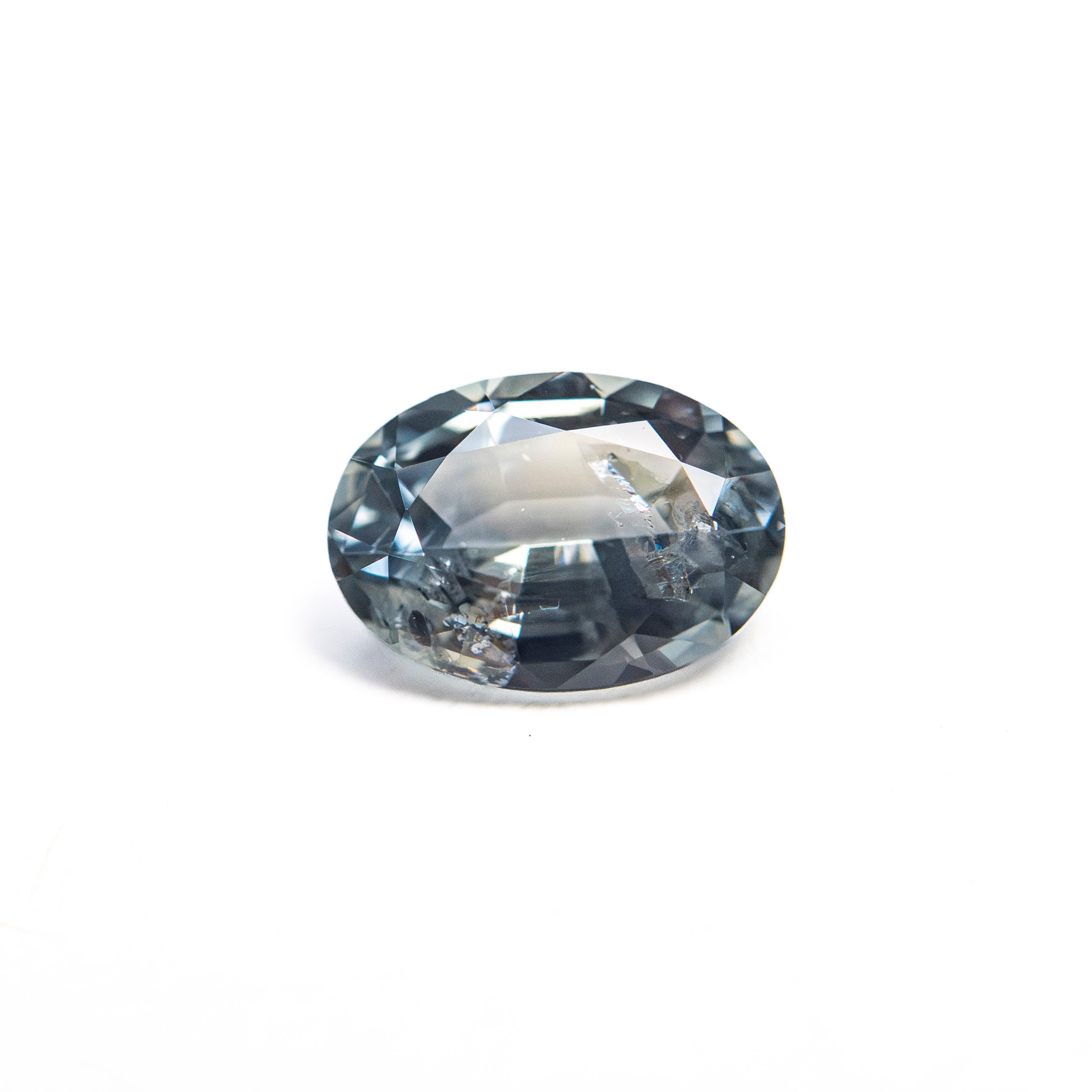 The 0.90ct 6.93x4.91x3.11mm Oval Brilliant Sapphire 26162-11 by East London jeweller Rachel Boston | Discover our collections of unique and timeless engagement rings, wedding rings, and modern fine jewellery.