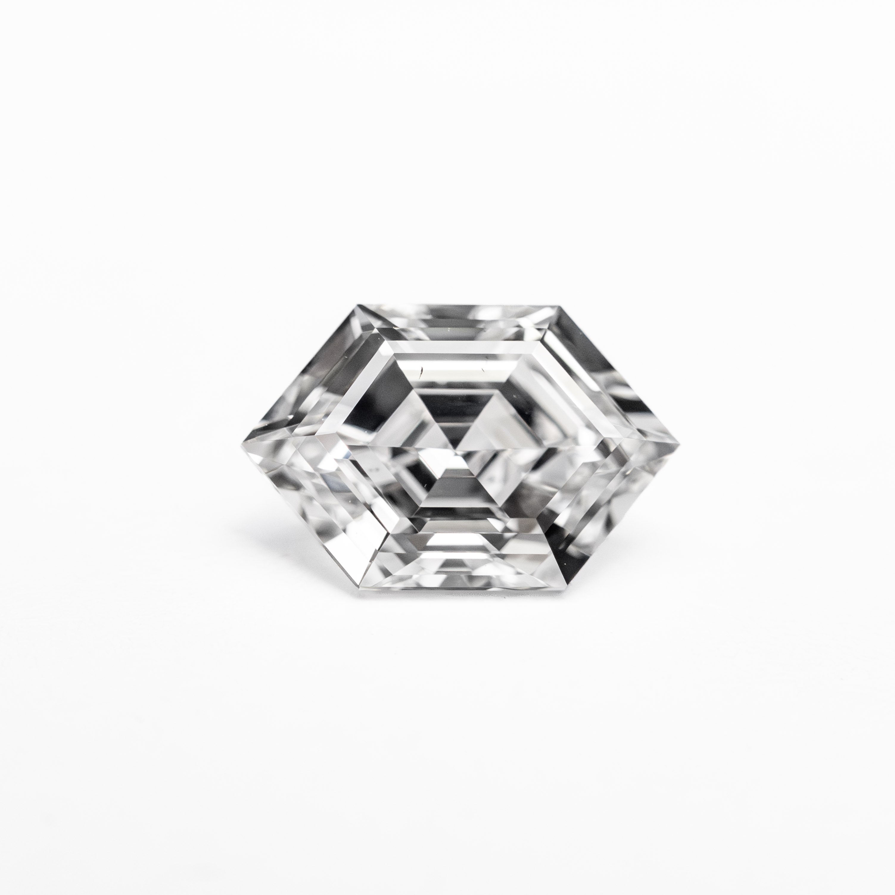 The 1.00ct 8.26x5.43x3.42mm SI1 F Hexagon Step Cut 🇨🇦 26243-01 by East London jeweller Rachel Boston | Discover our collections of unique and timeless engagement rings, wedding rings, and modern fine jewellery.