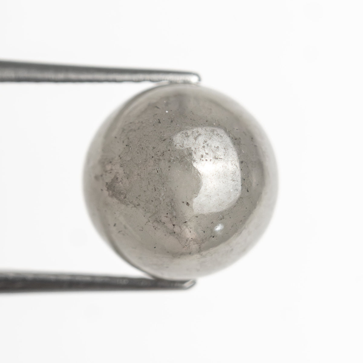 The 7.42ct 9.32x9.26x9.24mm Polished Bead 26287-01 by East London jeweller Rachel Boston | Discover our collections of unique and timeless engagement rings, wedding rings, and modern fine jewellery.