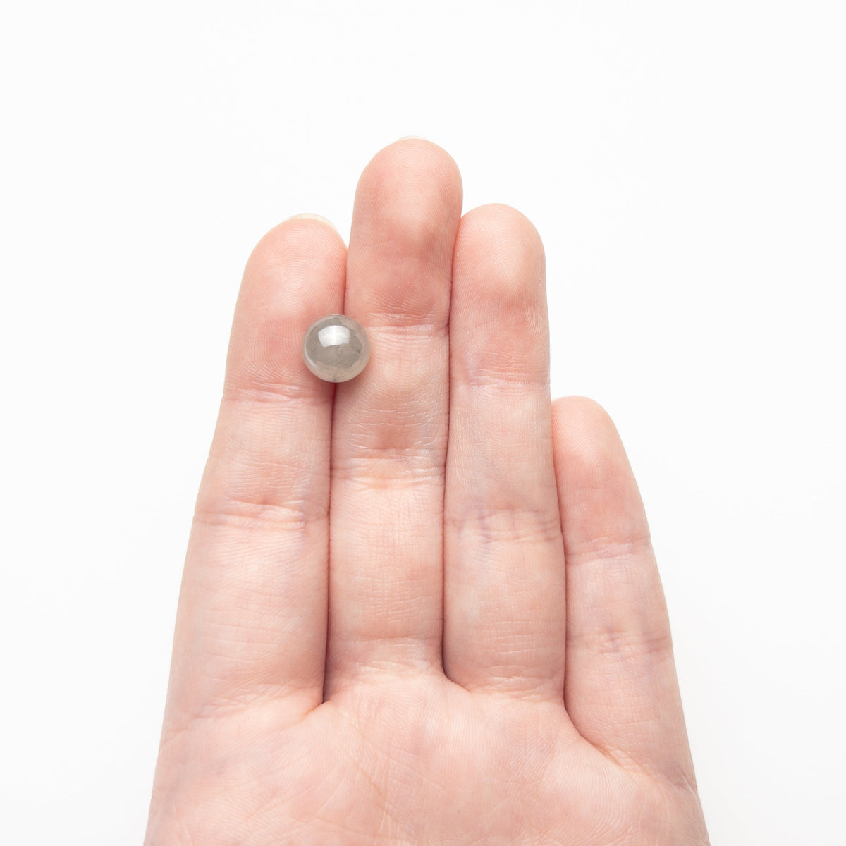 The 7.42ct 9.32x9.26x9.24mm Polished Bead 26287-01 by East London jeweller Rachel Boston | Discover our collections of unique and timeless engagement rings, wedding rings, and modern fine jewellery.