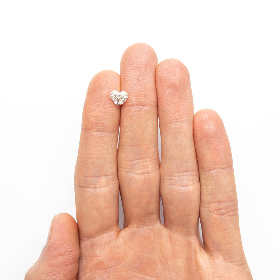 The 1.41ct 6.44x7.32x4.42mm GIA VVS2 L Geo Heart Step Cut 26314-02 by East London jeweller Rachel Boston | Discover our collections of unique and timeless engagement rings, wedding rings, and modern fine jewellery. - Rachel Boston Jewellery