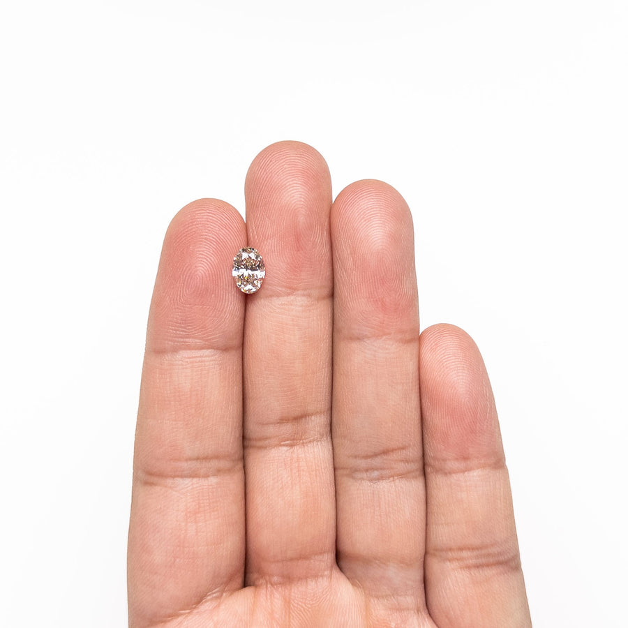 The 1.00ct 7.89x5.49x3.52mm VS1 N Oval Brilliant 🇿🇦 26318-01 by East London jeweller Rachel Boston | Discover our collections of unique and timeless engagement rings, wedding rings, and modern fine jewellery. - Rachel Boston Jewellery