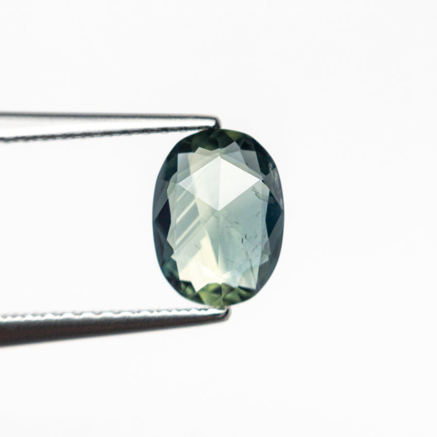 The 1.18ct 7.99x5.95x2.68mm Oval Rosecut Sapphire 26327-105 by East London jeweller Rachel Boston | Discover our collections of unique and timeless engagement rings, wedding rings, and modern fine jewellery. - Rachel Boston Jewellery