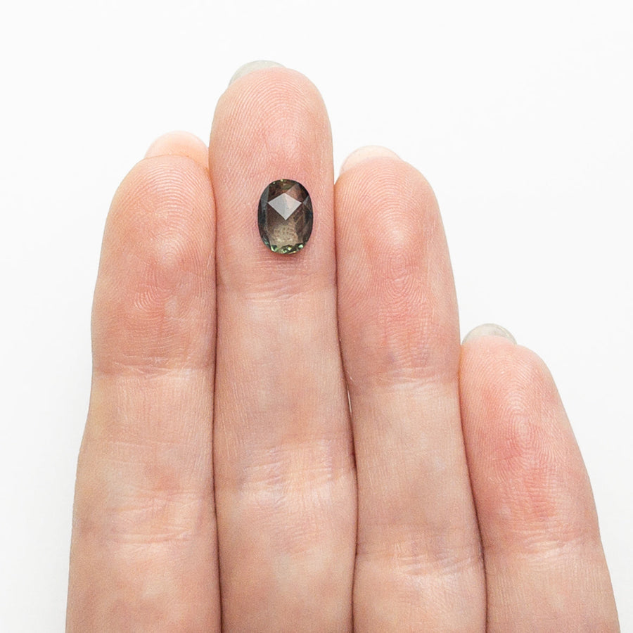 The 1.18ct 7.99x5.95x2.68mm Oval Rosecut Sapphire 26327-105 by East London jeweller Rachel Boston | Discover our collections of unique and timeless engagement rings, wedding rings, and modern fine jewellery. - Rachel Boston Jewellery