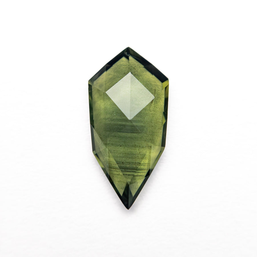 The 1.17ct 10.56x5.24x2.34mm Shield Rosecut Sapphire 26327-21 by East London jeweller Rachel Boston | Discover our collections of unique and timeless engagement rings, wedding rings, and modern fine jewellery. - Rachel Boston Jewellery