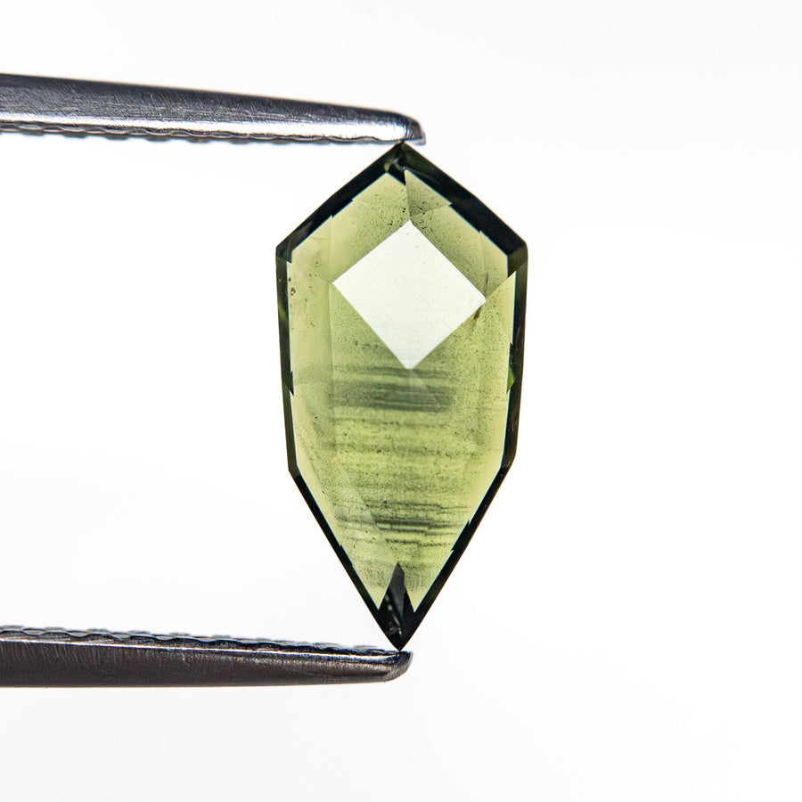 The 1.17ct 10.56x5.24x2.34mm Shield Rosecut Sapphire 26327-21 by East London jeweller Rachel Boston | Discover our collections of unique and timeless engagement rings, wedding rings, and modern fine jewellery. - Rachel Boston Jewellery