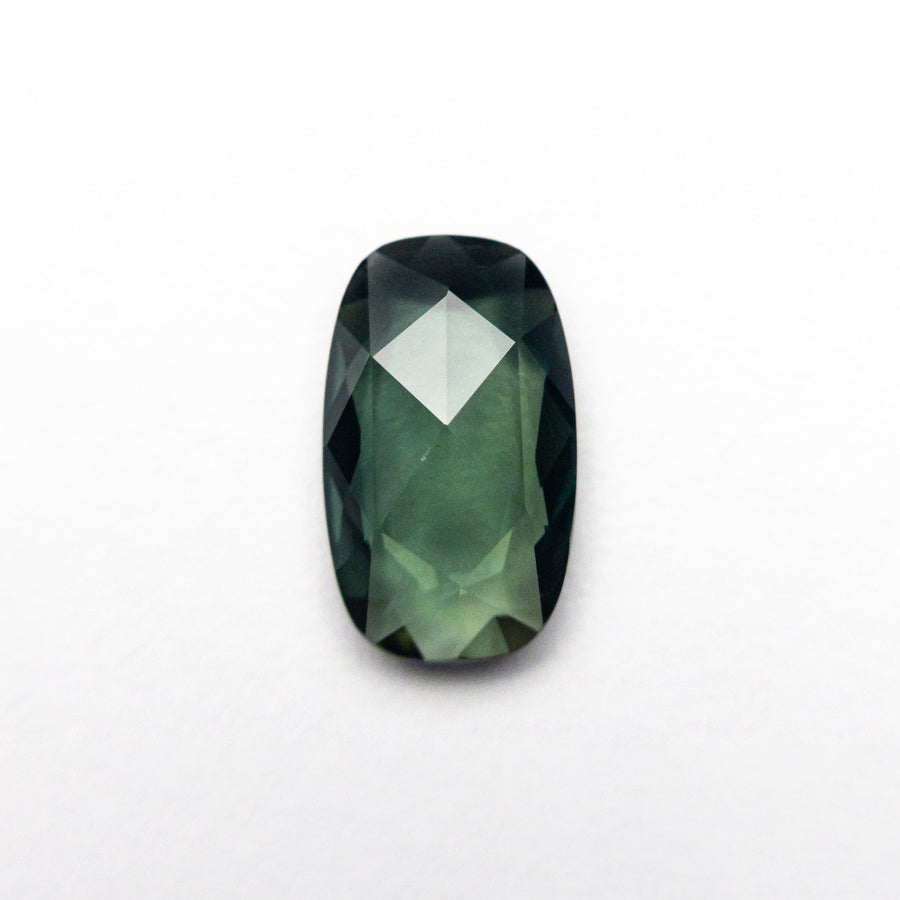 The 1.41ct 9.42x5.62x2.52mm Cushion Rosecut Sapphire 26327-69 by East London jeweller Rachel Boston | Discover our collections of unique and timeless engagement rings, wedding rings, and modern fine jewellery. - Rachel Boston Jewellery