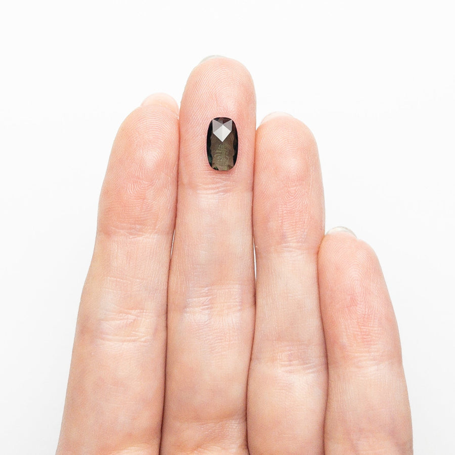 The 1.41ct 9.42x5.62x2.52mm Cushion Rosecut Sapphire 26327-69 by East London jeweller Rachel Boston | Discover our collections of unique and timeless engagement rings, wedding rings, and modern fine jewellery. - Rachel Boston Jewellery
