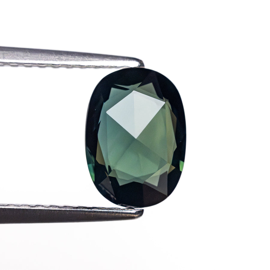 The 1.63ct 8.72x6.33x2.96mm Oval Rosecut Sapphire 26327-82 by East London jeweller Rachel Boston | Discover our collections of unique and timeless engagement rings, wedding rings, and modern fine jewellery. - Rachel Boston Jewellery