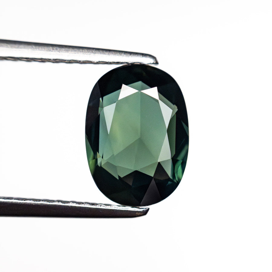 The 1.63ct 8.72x6.33x2.96mm Oval Rosecut Sapphire 26327-82 by East London jeweller Rachel Boston | Discover our collections of unique and timeless engagement rings, wedding rings, and modern fine jewellery. - Rachel Boston Jewellery