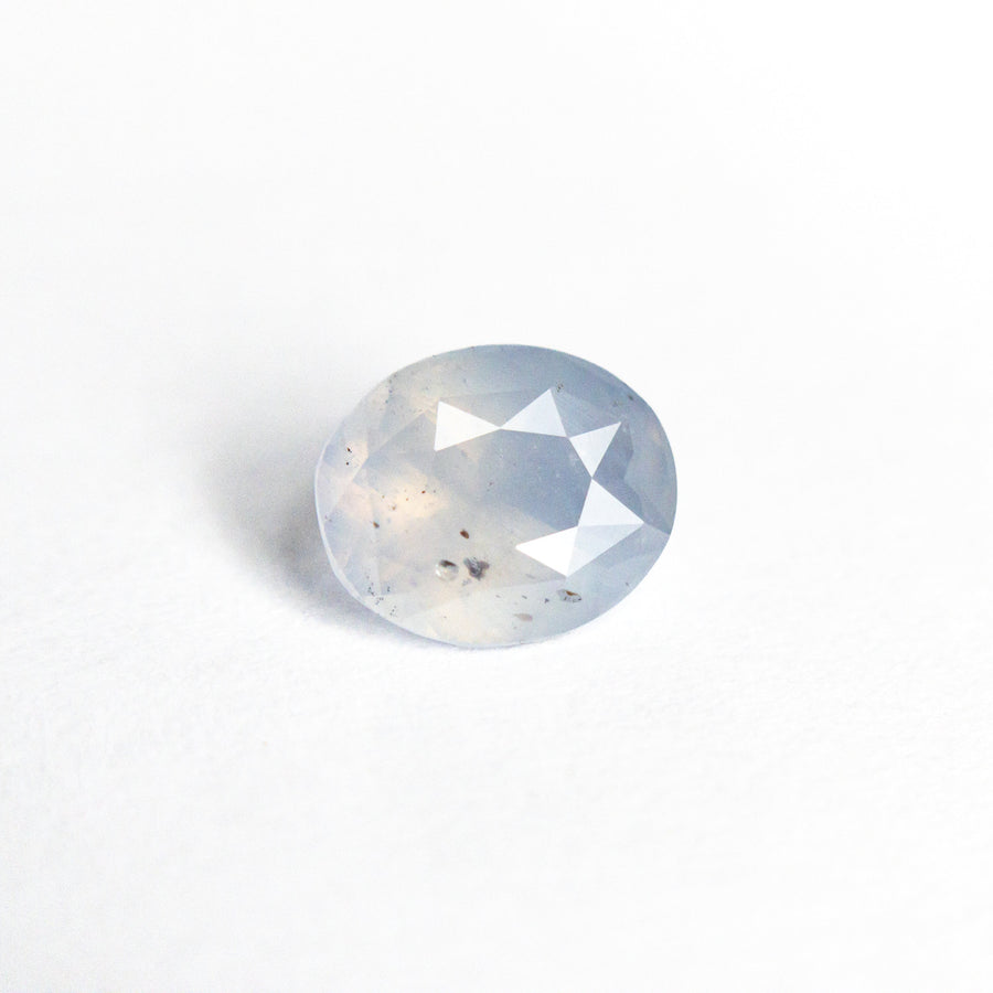 The 1.07ct 6.89x5.68x3.42mm Oval Brilliant Sapphire 26380-01 by East London jeweller Rachel Boston | Discover our collections of unique and timeless engagement rings, wedding rings, and modern fine jewellery. - Rachel Boston Jewellery