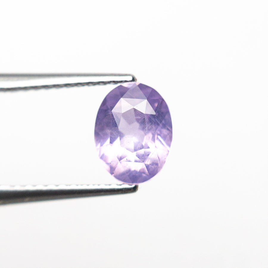 The 1.52ct 7.59x5.82x4.13mm Oval Brilliant Sapphire 26420-01 by East London jeweller Rachel Boston | Discover our collections of unique and timeless engagement rings, wedding rings, and modern fine jewellery. - Rachel Boston Jewellery