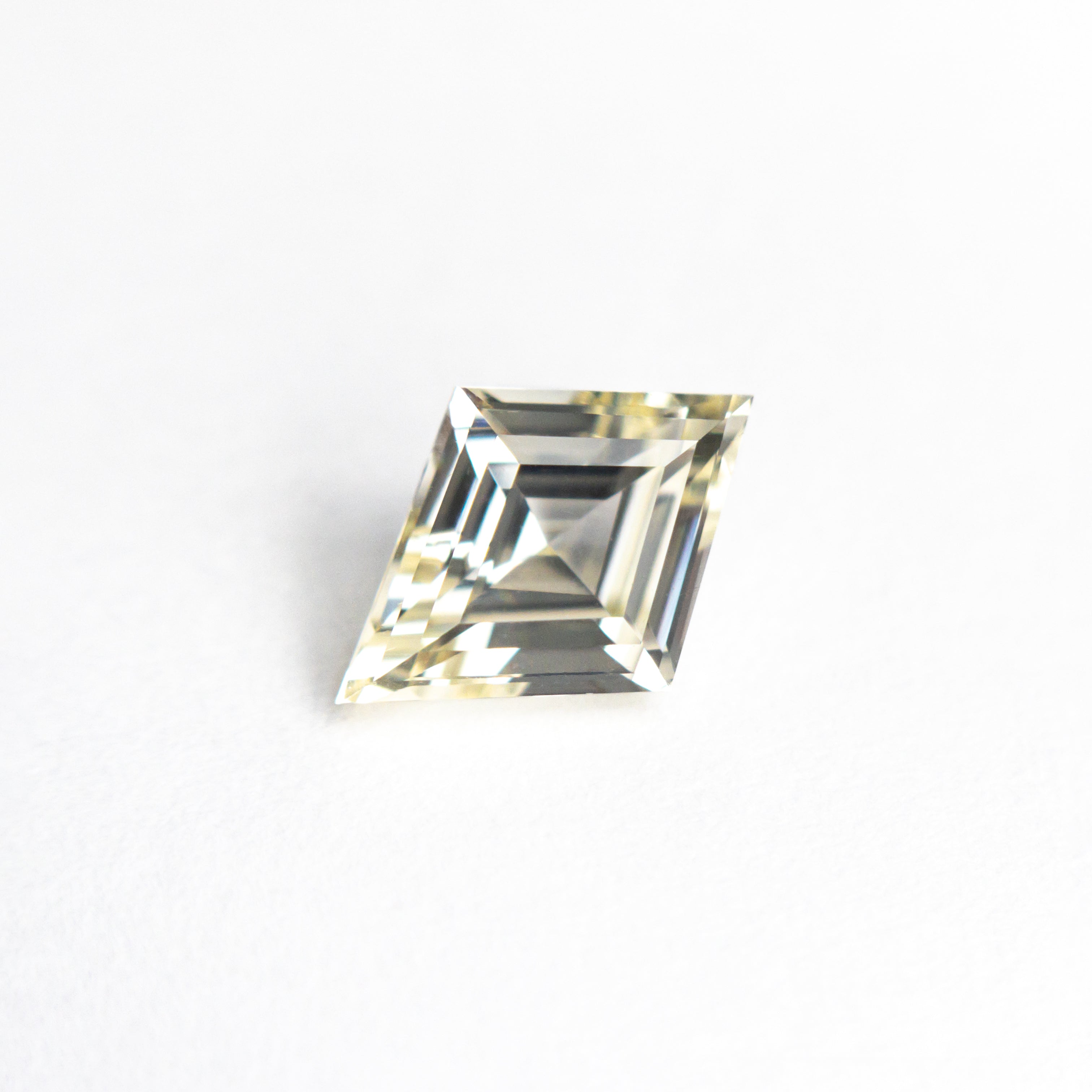 The 1.09ct 8.89x6.32x3.60mm Lozenge Step Cut Sapphire 26439-01 by East London jeweller Rachel Boston | Discover our collections of unique and timeless engagement rings, wedding rings, and modern fine jewellery.