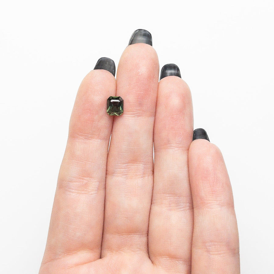 The 1.16ct 6.34x5.50x3.56mm Cut Corner Rectangle Step Cut Sapphire 26503-01 by East London jeweller Rachel Boston | Discover our collections of unique and timeless engagement rings, wedding rings, and modern fine jewellery. - Rachel Boston Jewellery