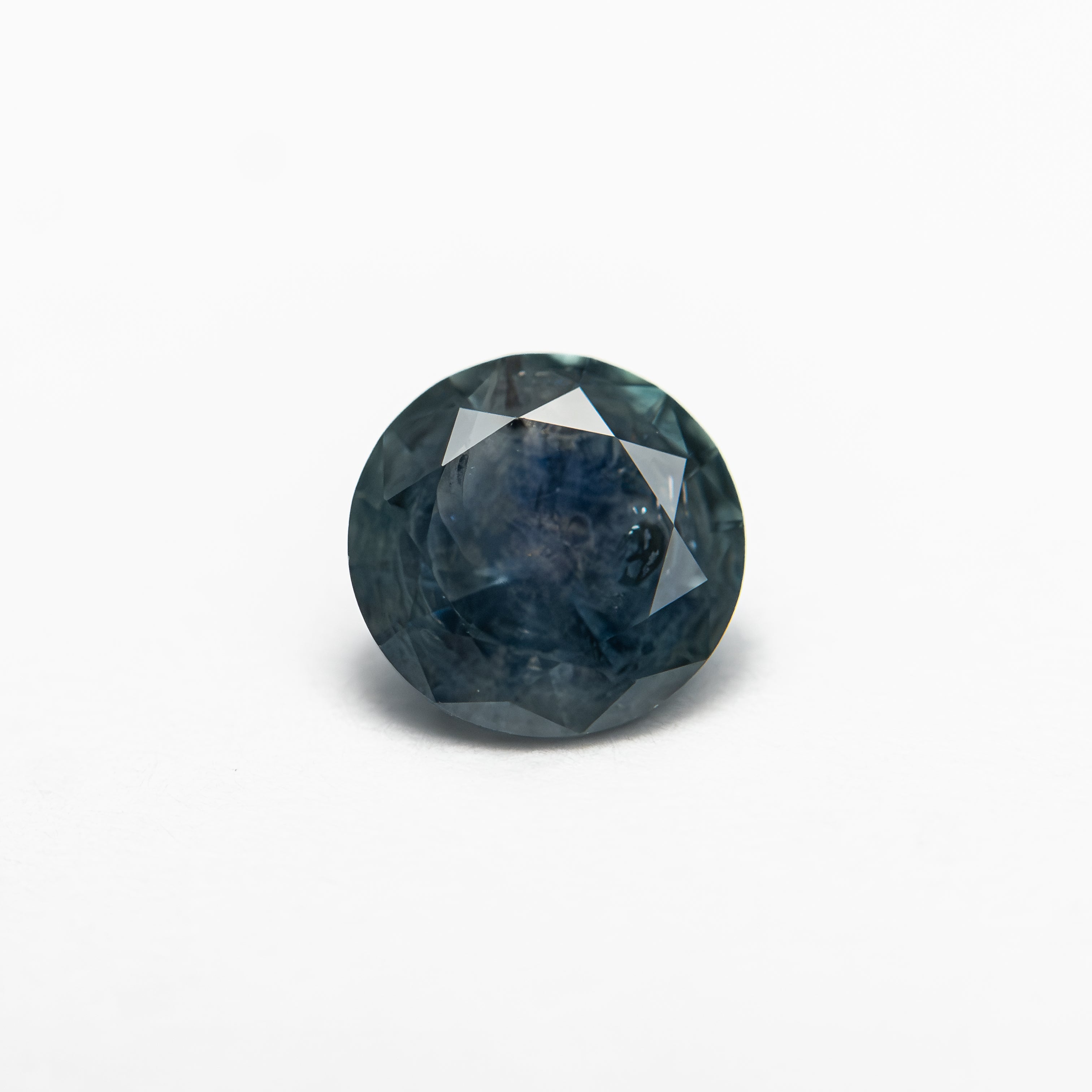 The 0.93ct 6.00x5.98x3.65mm Round Brilliant Sapphire 26526-12 by East London jeweller Rachel Boston | Discover our collections of unique and timeless engagement rings, wedding rings, and modern fine jewellery.