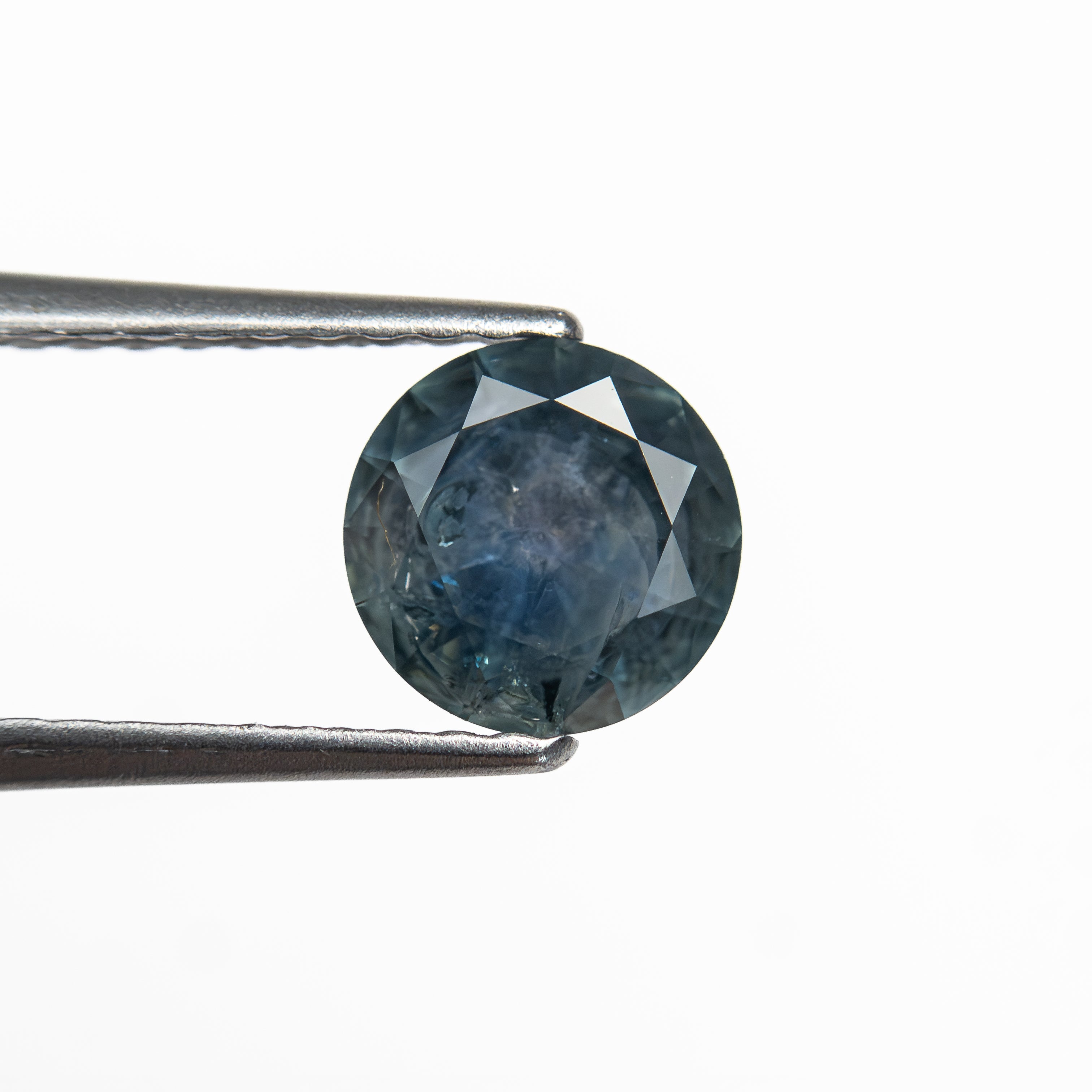 The 0.93ct 6.00x5.98x3.65mm Round Brilliant Sapphire 26526-12 by East London jeweller Rachel Boston | Discover our collections of unique and timeless engagement rings, wedding rings, and modern fine jewellery.