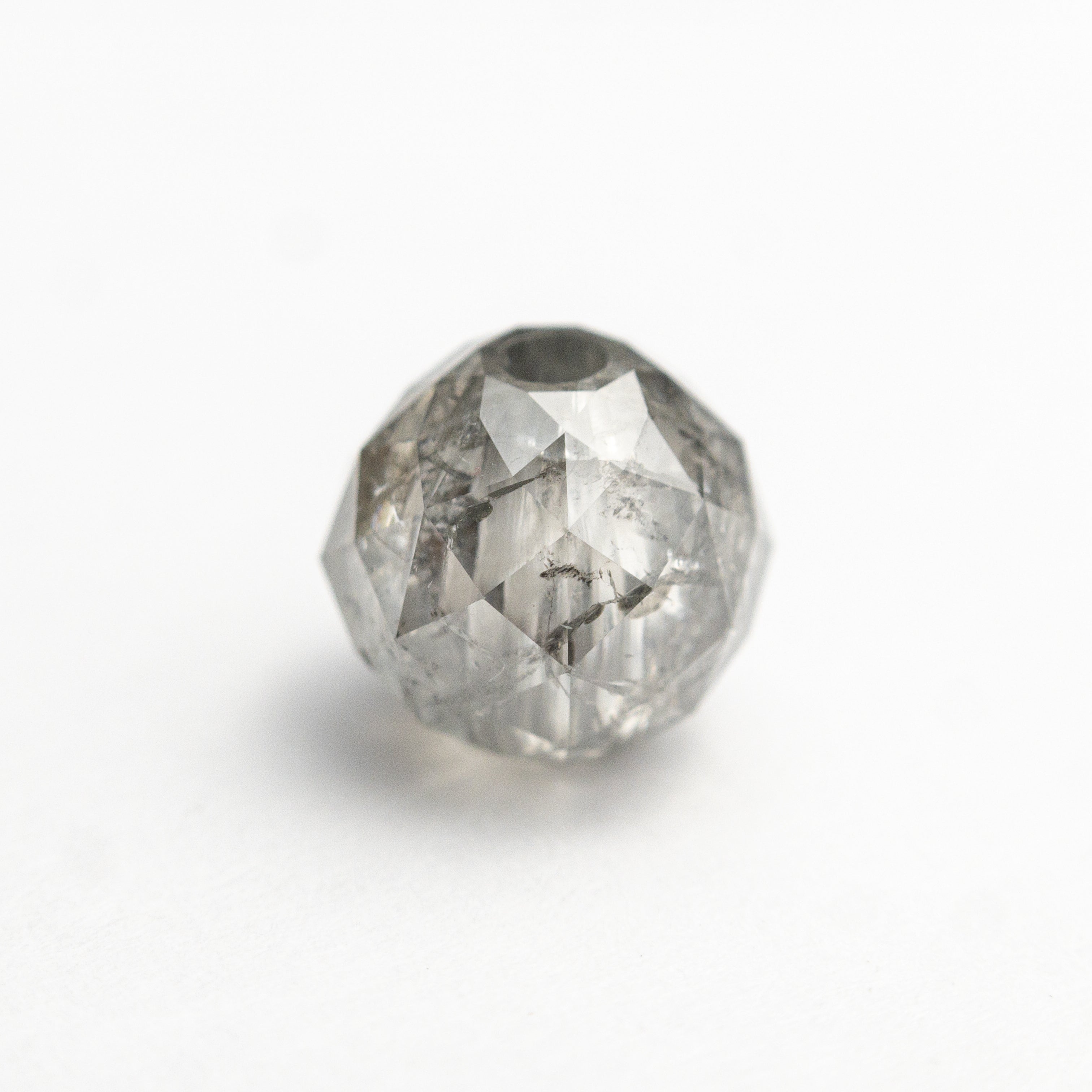 The 2.82ct 6.62x6.75x6.76mm Faceted Bead 26554-02 by East London jeweller Rachel Boston | Discover our collections of unique and timeless engagement rings, wedding rings, and modern fine jewellery.