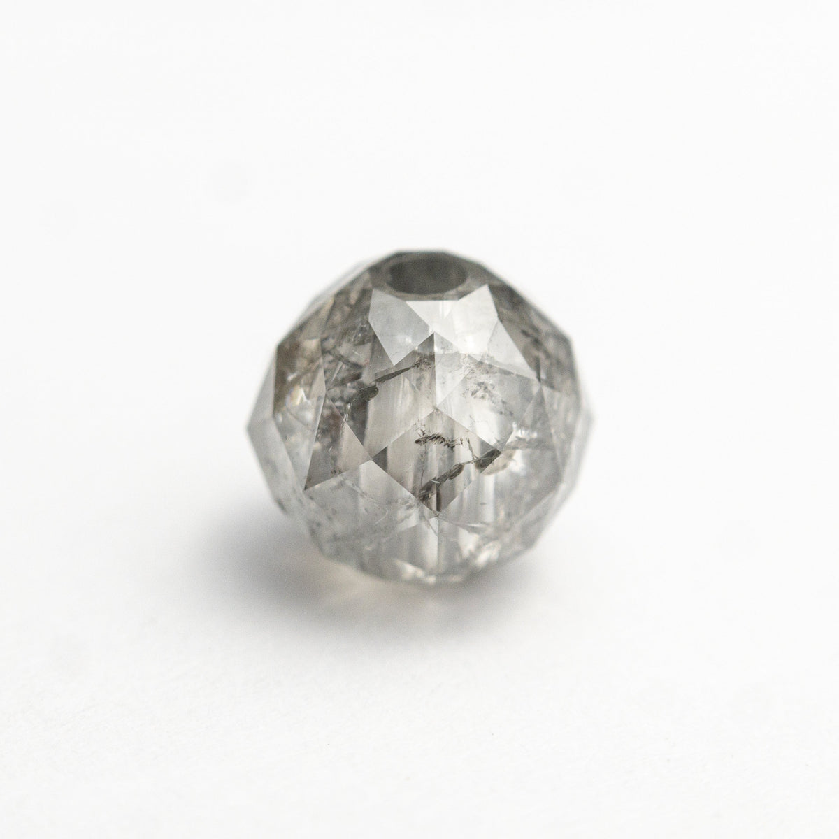 The 2.82ct 6.62x6.75x6.76mm Faceted Bead 26554-02 by East London jeweller Rachel Boston | Discover our collections of unique and timeless engagement rings, wedding rings, and modern fine jewellery.
