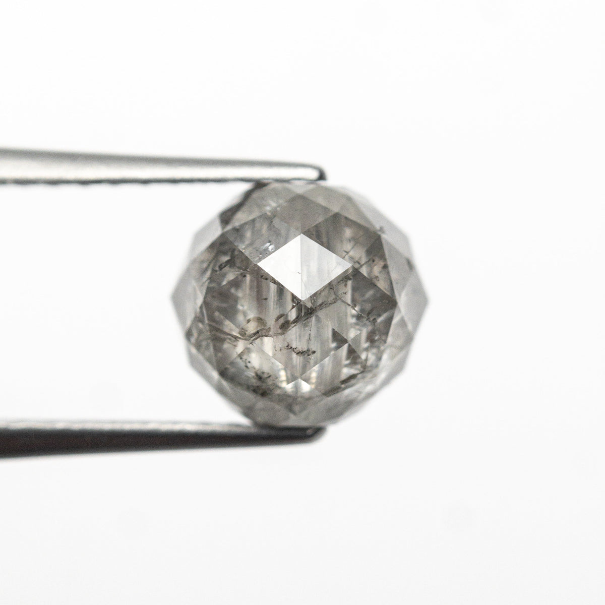 The 2.82ct 6.62x6.75x6.76mm Faceted Bead 26554-02 by East London jeweller Rachel Boston | Discover our collections of unique and timeless engagement rings, wedding rings, and modern fine jewellery.