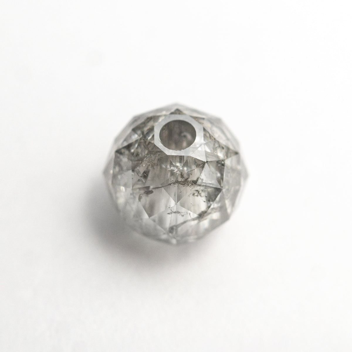 The 2.82ct 6.62x6.75x6.76mm Faceted Bead 26554-02 by East London jeweller Rachel Boston | Discover our collections of unique and timeless engagement rings, wedding rings, and modern fine jewellery.