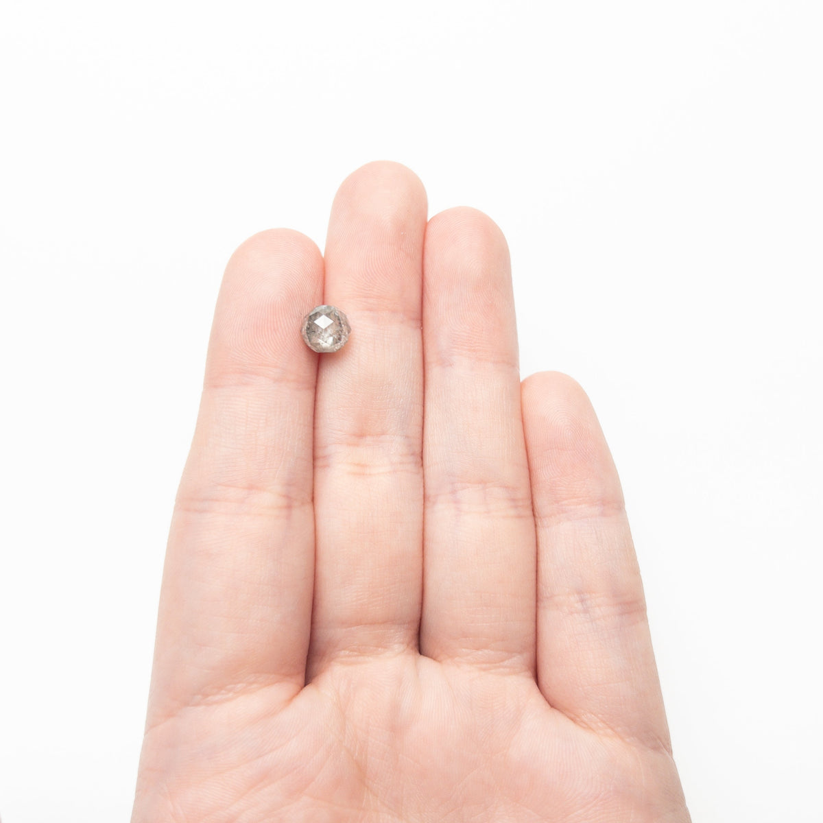 The 2.82ct 6.62x6.75x6.76mm Faceted Bead 26554-02 by East London jeweller Rachel Boston | Discover our collections of unique and timeless engagement rings, wedding rings, and modern fine jewellery.