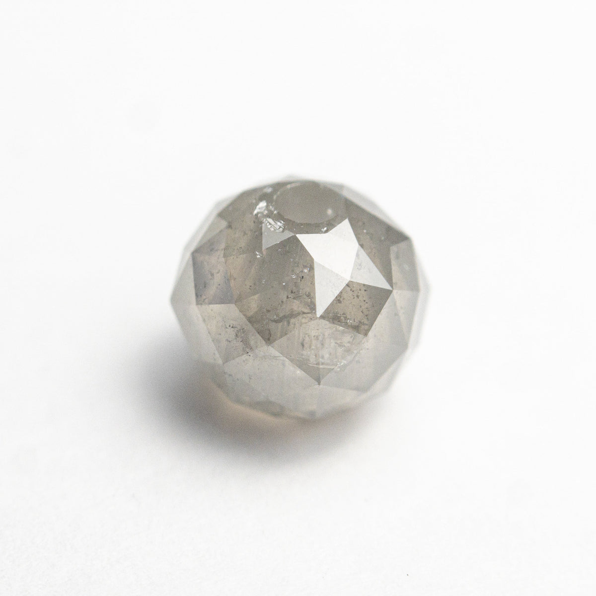 The 2.92ct 6.68x6.90x6.90mm Faceted Bead 26554-03 by East London jeweller Rachel Boston | Discover our collections of unique and timeless engagement rings, wedding rings, and modern fine jewellery.