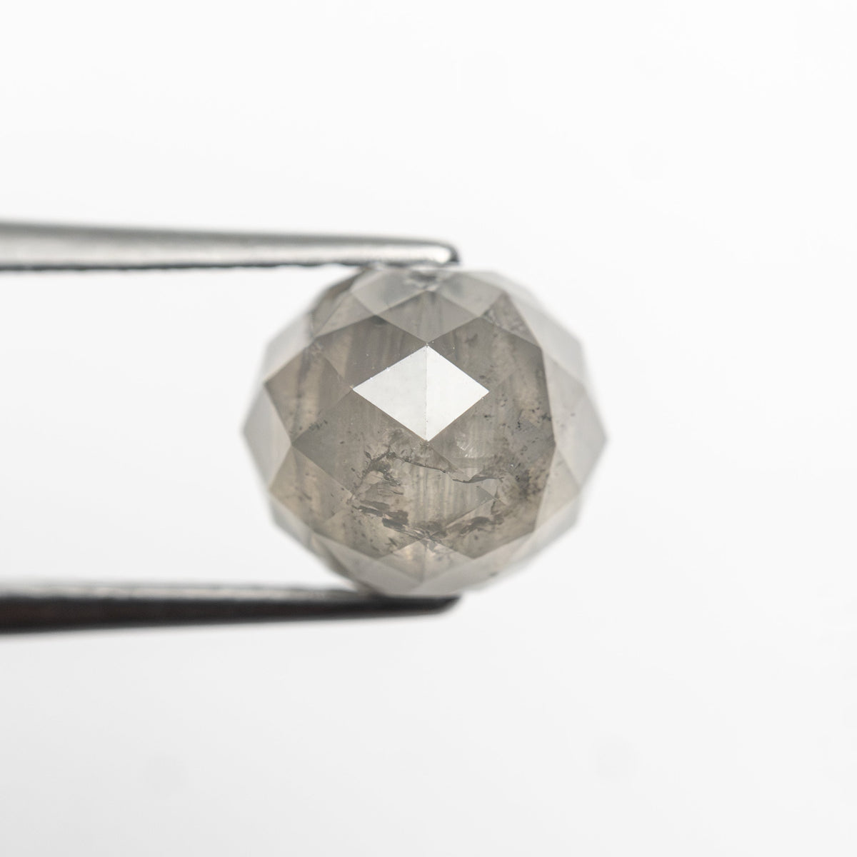 The 2.92ct 6.68x6.90x6.90mm Faceted Bead 26554-03 by East London jeweller Rachel Boston | Discover our collections of unique and timeless engagement rings, wedding rings, and modern fine jewellery.