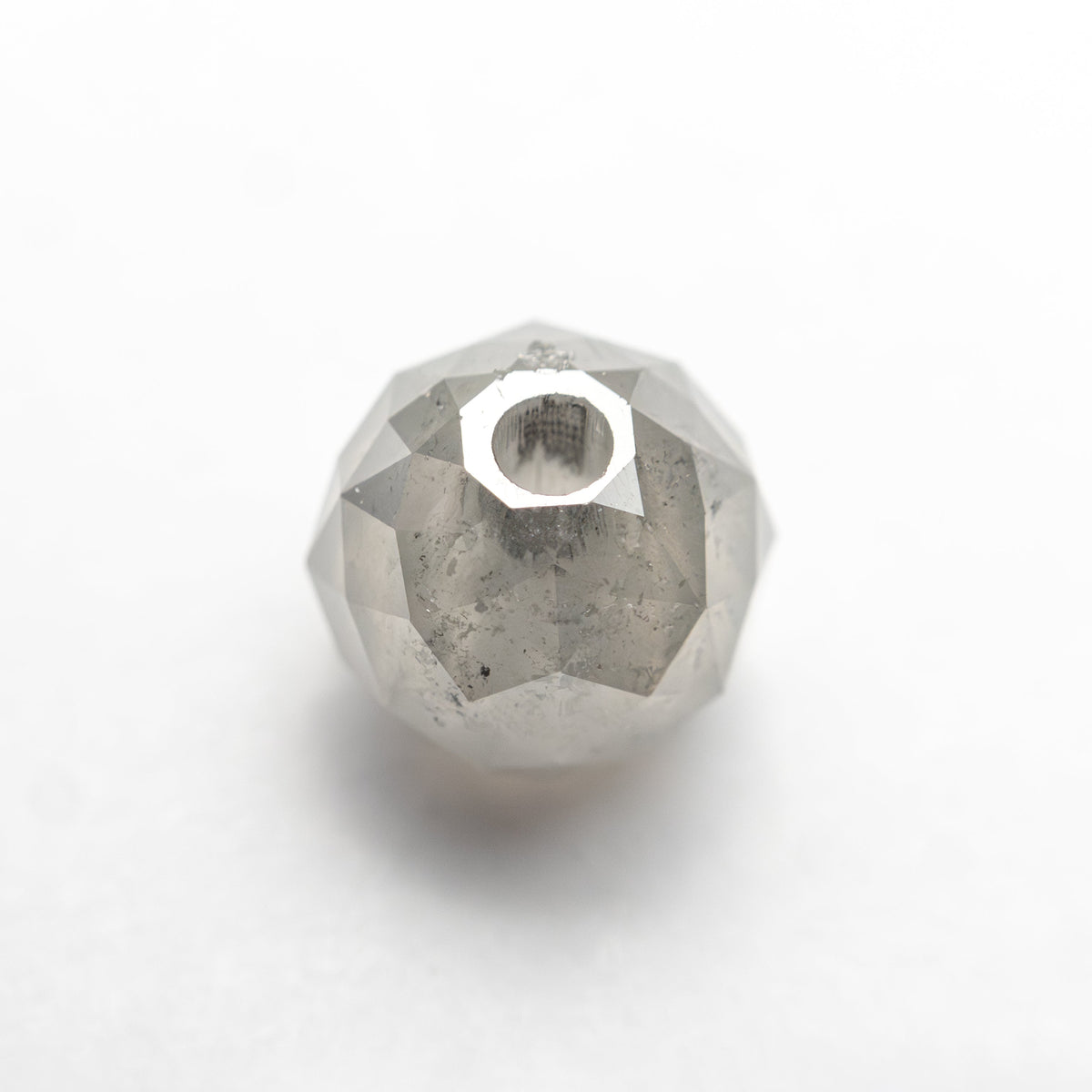 The 2.92ct 6.68x6.90x6.90mm Faceted Bead 26554-03 by East London jeweller Rachel Boston | Discover our collections of unique and timeless engagement rings, wedding rings, and modern fine jewellery.